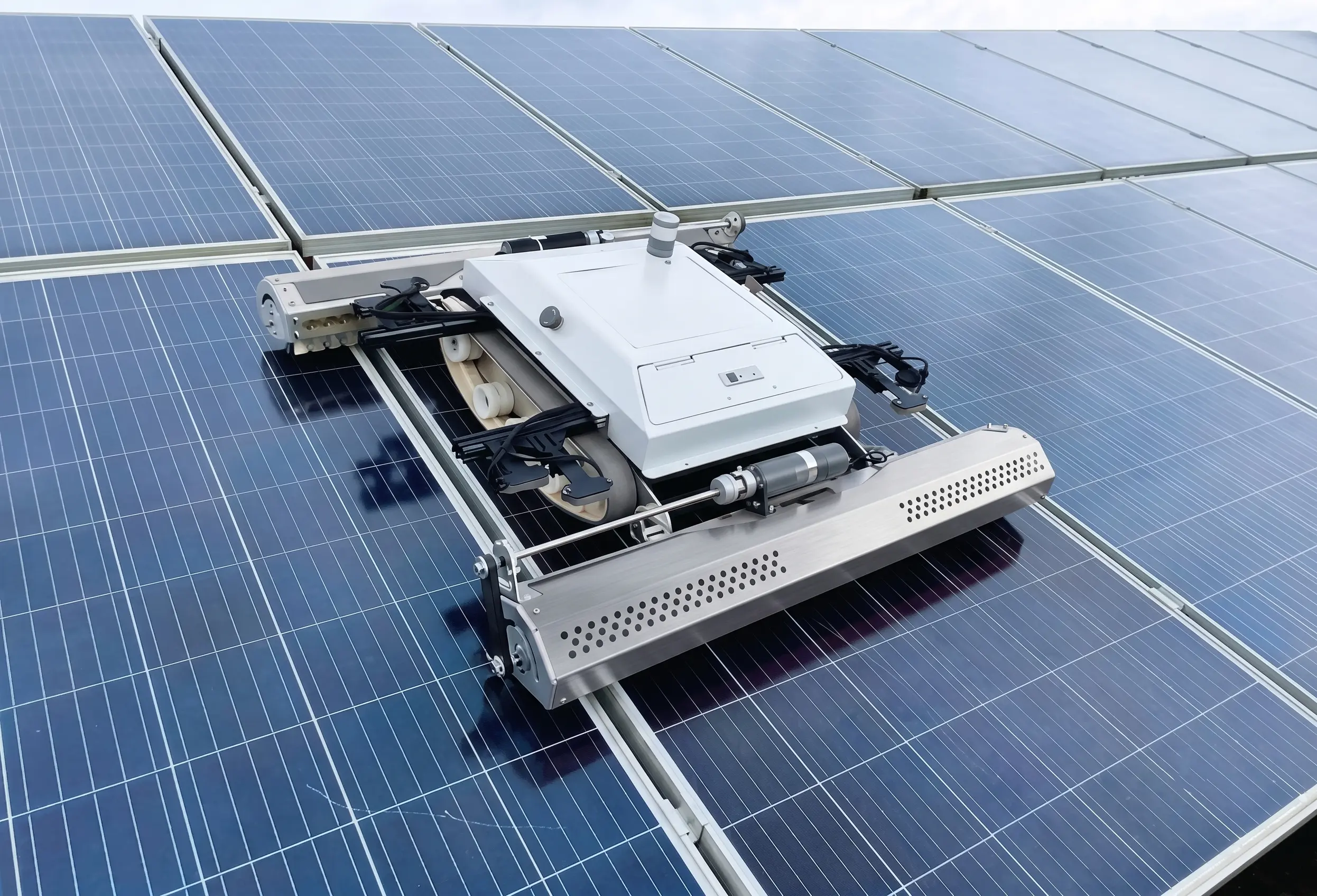 Droid robot on a commercial rooftop solar array