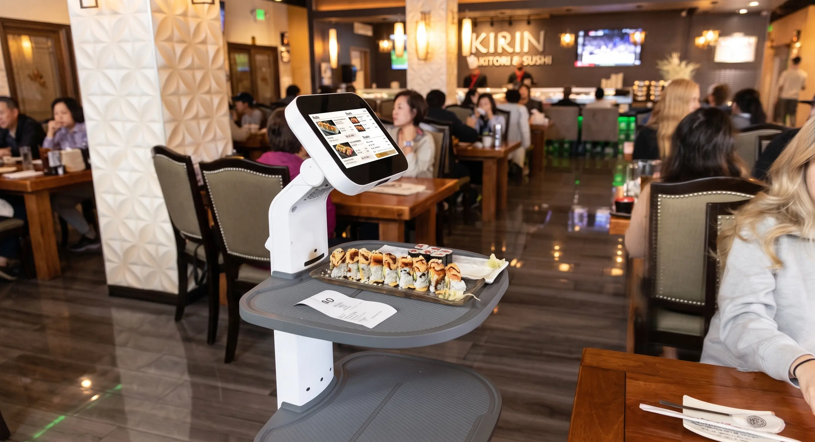 Droid restaurant robot in a dining room